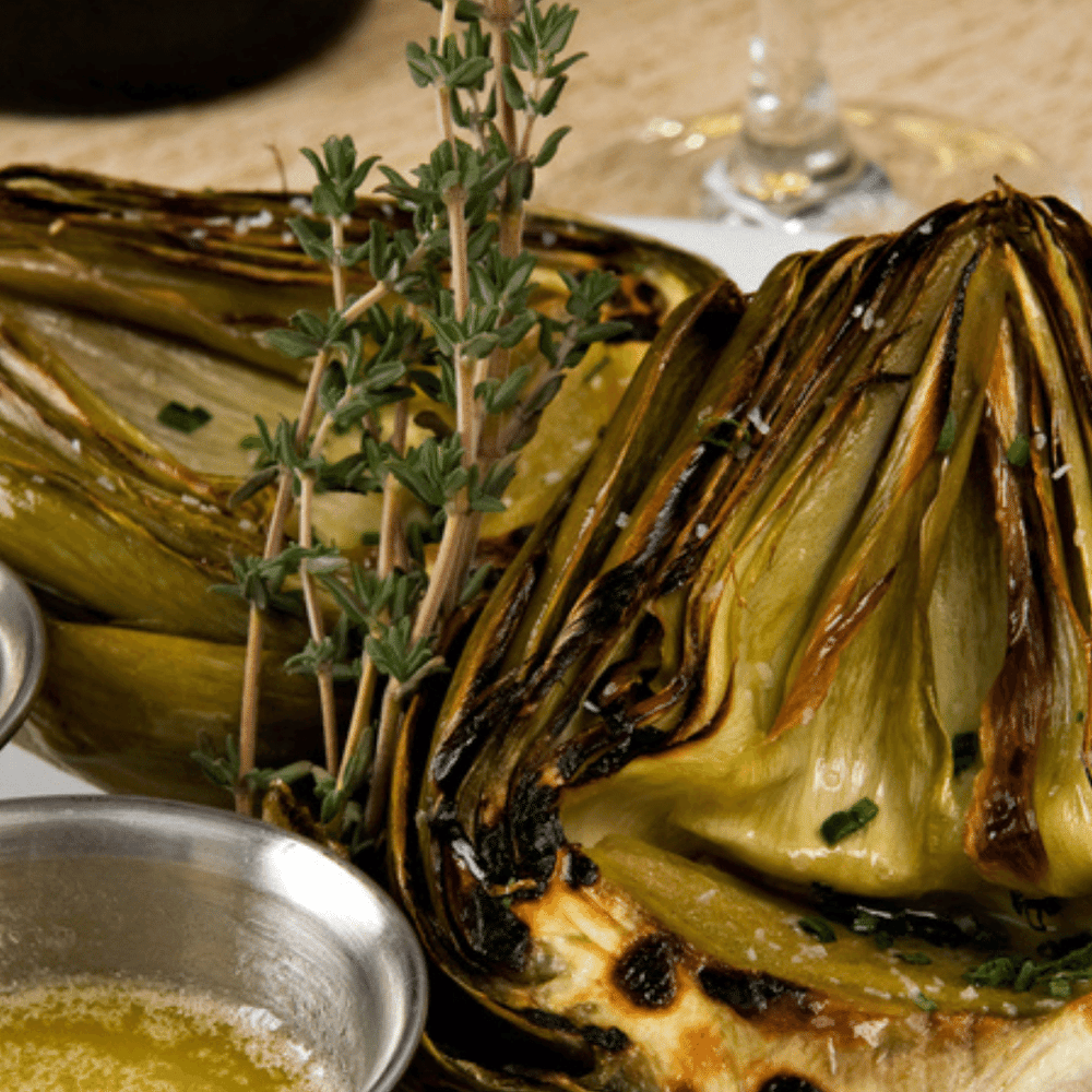 grilled artichokes recipe with Chile Crunch spicy condiment